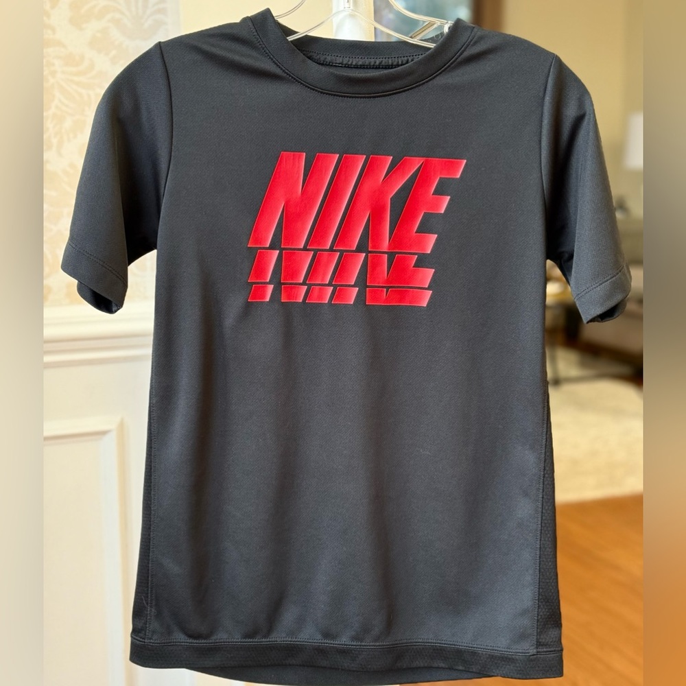 Nike Dri-fit, dark black SS shirt with red logo. Like new!
